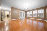 The dining area flows seamlessly into the kitchen, providing easy access and convenience.