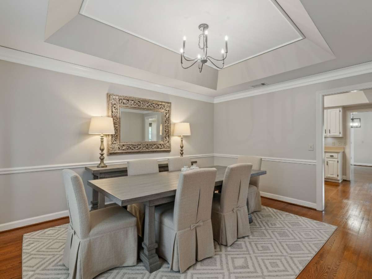 Formal Dining Room digitally staged - can also be a main floor office