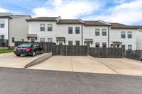 Driveway comfortably holds 2 large vehicles. Guest parking is available at the front and rear of the home.
