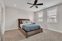Large primary bedroom will comfortably hold a king bed and all the things!