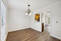 The Formal Dining Room has large windows offering lots of natural light