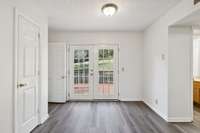 The Breakfast Nook has LVP flooring and door leading to a wonderful deck and large patio