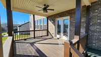 Large 14'x12' upgraded covered deck for enjoyable outdoor eating table and relaxing under the gentle breeze of the ceiling fan!