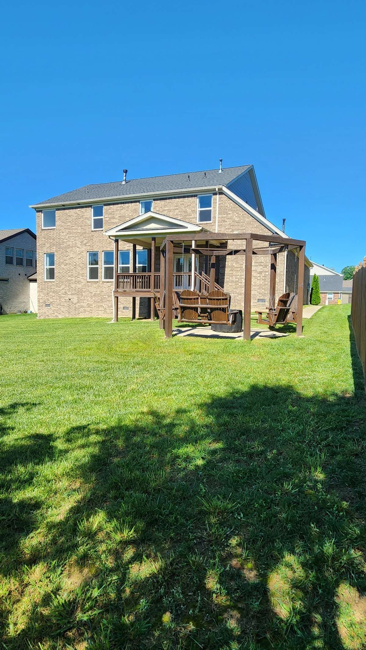 Upgraded sidewalk from the front of the house to the back!  This quiet back yard will do the trick!