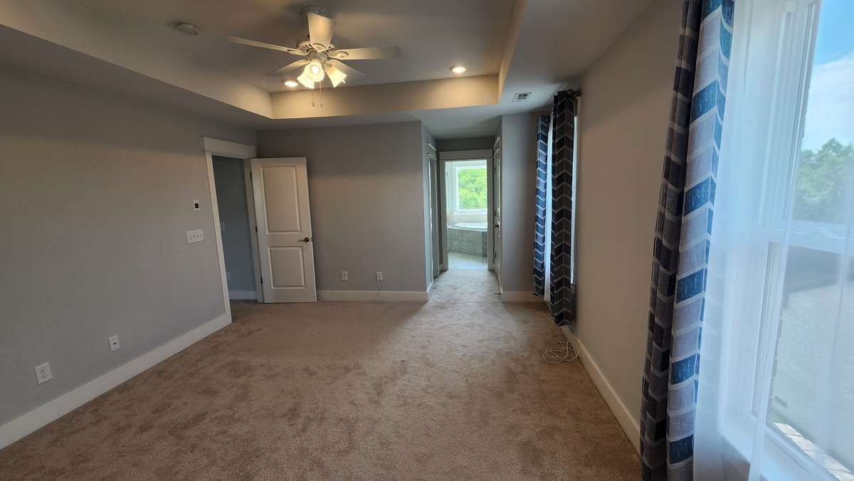 Spacious primary bedroom and three closets to boot!  Soft and warm plush carpeting in all the bedrooms...how luxurious!