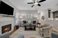 Lovely Fireplace with marble surround and plenty of space for seating