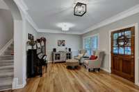 Flex Room off entry can be used as a sitting area, hobby/playroom, or home office.