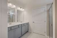Double vanity in the en suite primary bathroom.