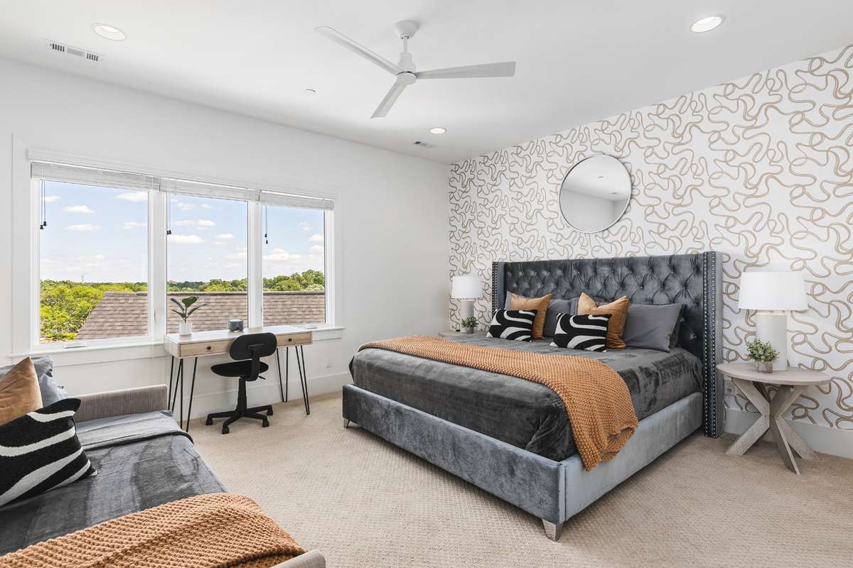 Primary bedroom on top floor with walk-in closet + a day bed