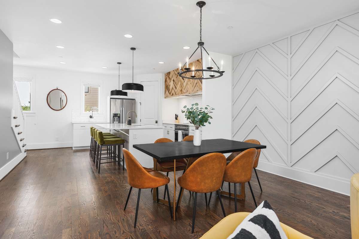 Dining room off kitchen with feature wall