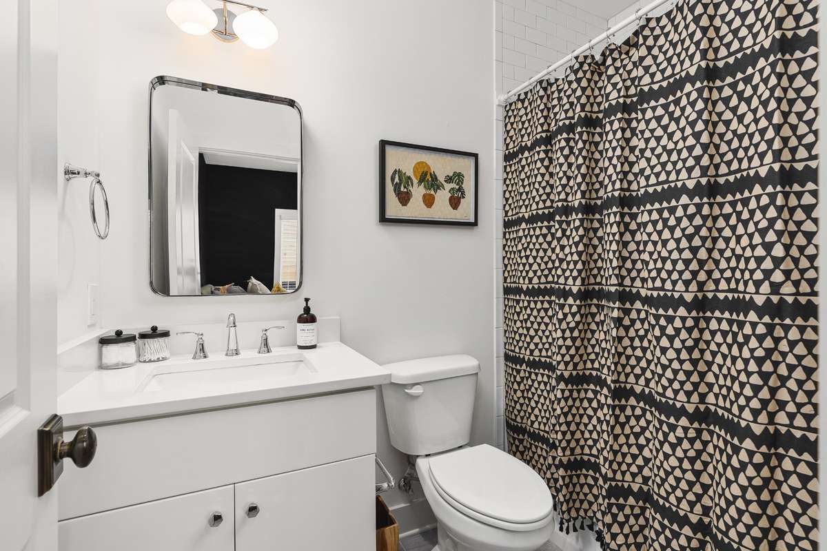 Full bath - tub/shower combo in bedroom 1