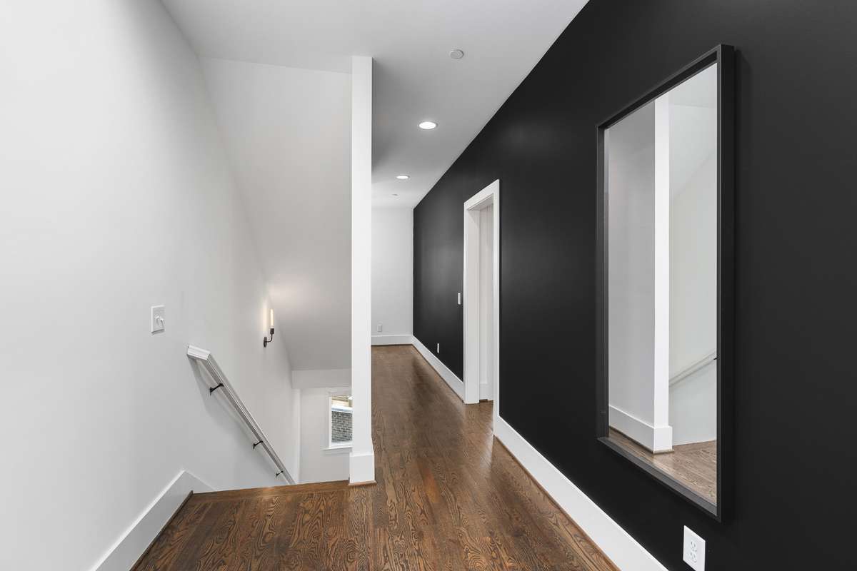 Third level hall way. Third floor features 2 bedrooms with a jack and jill full bathroom