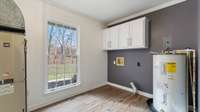 Laundry room with lots of natural light.
