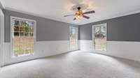 Primary Bedroom suite with lots of natural light.