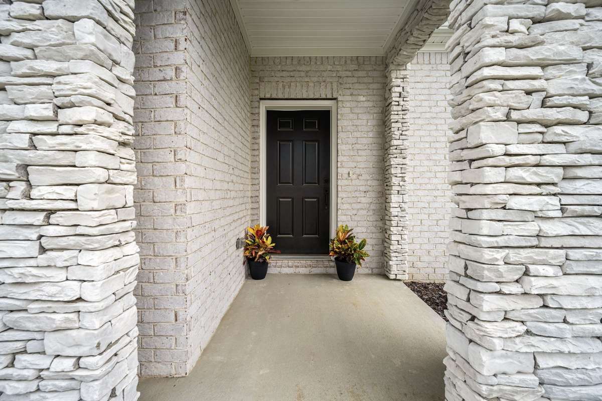 Welcoming covered front patio