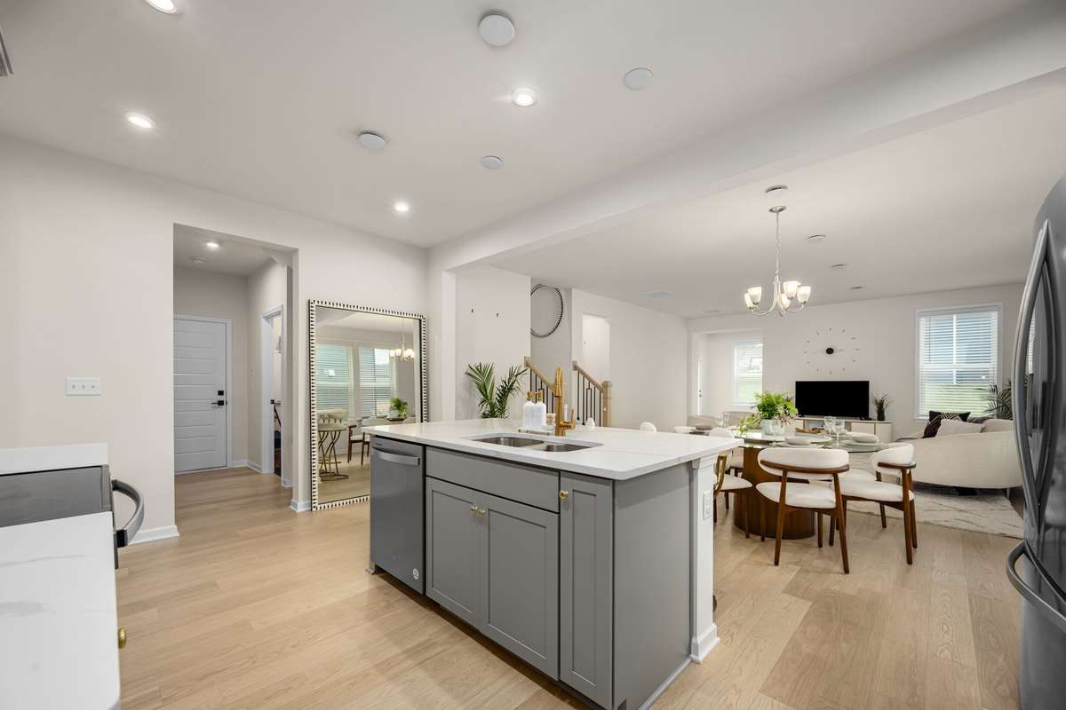 Quartz countertops, soft close cabinets and spacious kitchen island.