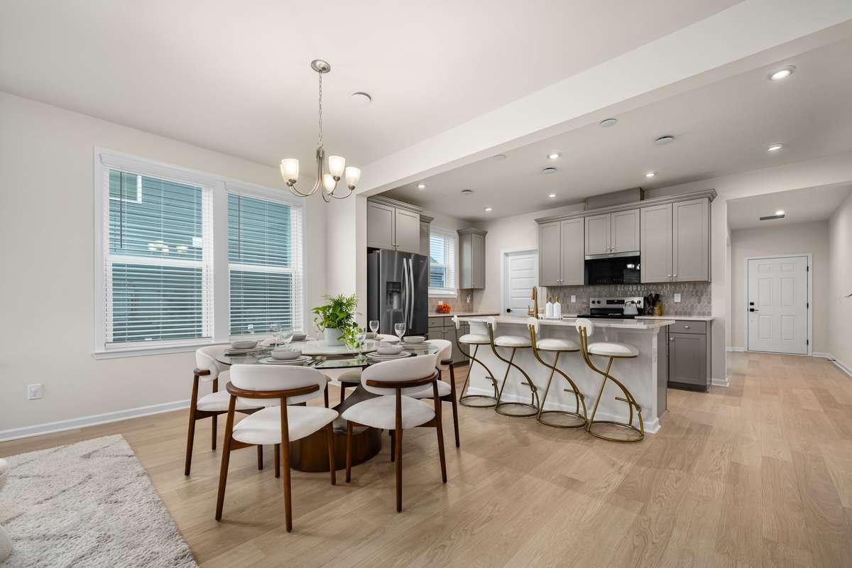 Open layout living with seamless flow from kitchen to living room. Plenty of space for a large dining table.