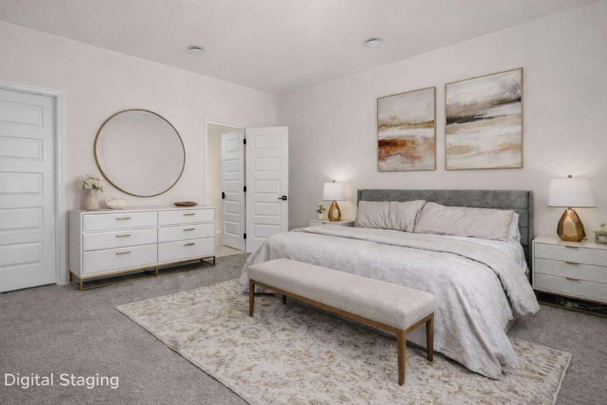 Digitally staged to show how additional decor can enhance the large primary suite.