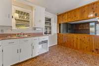 Kitchen could be opened into living room or the den with the right contractor.