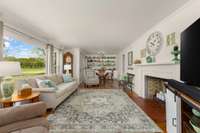 Enjoy family time in this huge living room with a wood burning fireplace.