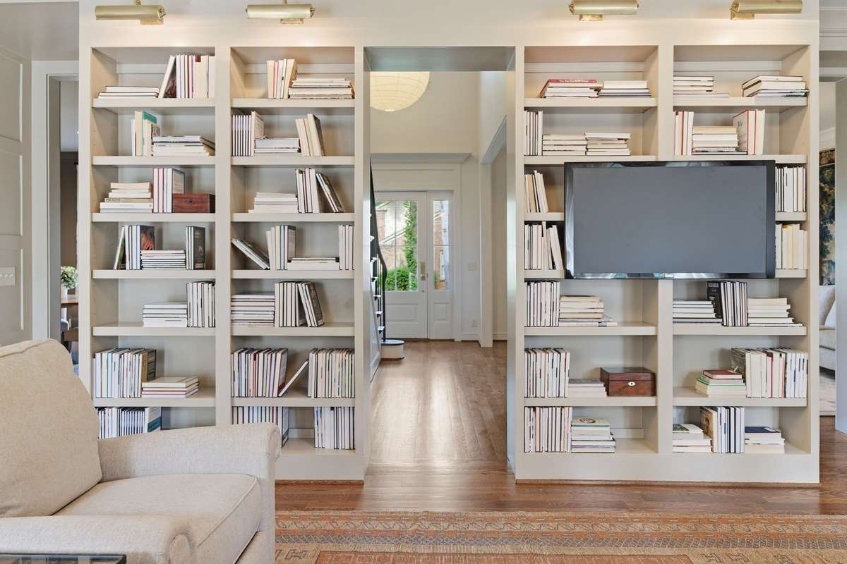 CUSTOM BOOK SHELVING WIRED FOR TELEVISION