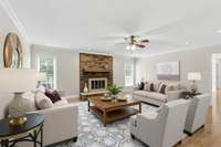 Generously sized living room with cozy fireplace