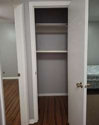 One of four closets located in the hallway.  Tons of storage space in this home!