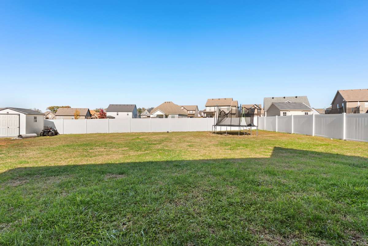 Large fully fenced in backyard with white vinal privacy fence. 561 Tacoma Dr Clarksville TN 37043