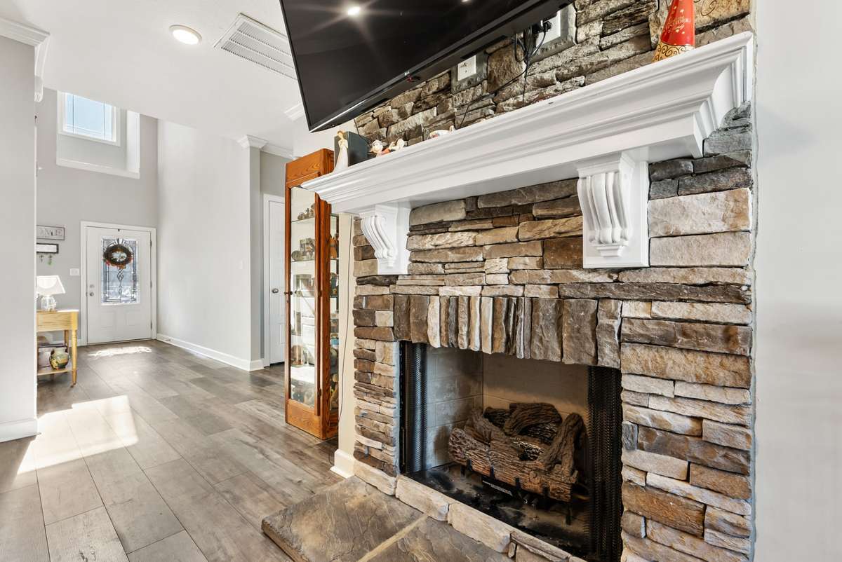 Stacked stone mantel creates a gorgeous focal point to your living room.  561 Tacoma Dr Clarksville TN 37043