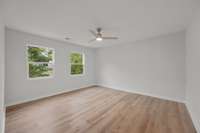 The primary bedroom is huge, and filled with natural light.