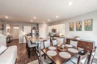 The dining area is perfectly positioned just off the kitchen, creating a comfortable flow for everyday meals and gatherings.