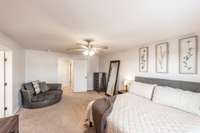 The spacious layout of the bathroom allows for easy movement and functionality.