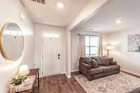 To the left as you enter the home, you'll find the office space which as you can see, they use as an additional living area.