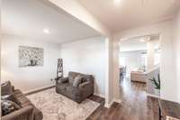 As you enter the home, you'll immediately notice the LVP flooring throughout the main level.