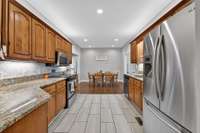 A view from the garage door looking into the kitchen and dining room.