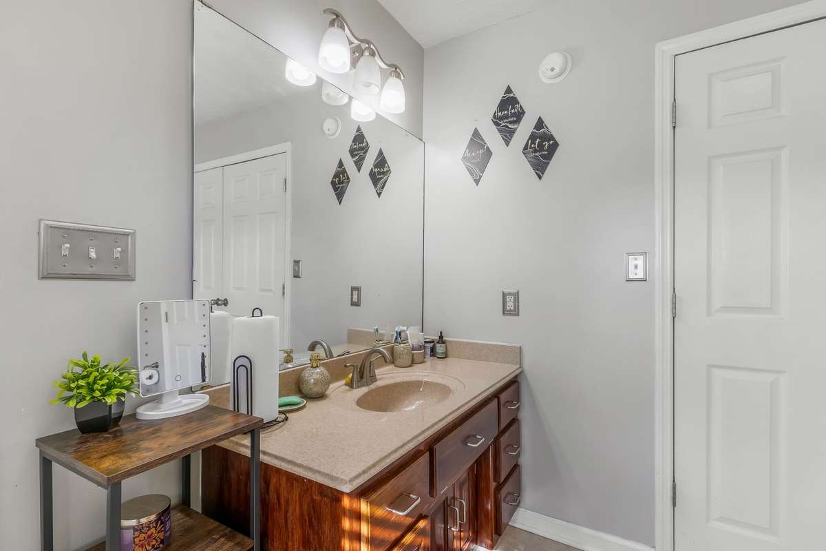 This bathroom is located off of the main area of the home and very close to the bedroom that was most recently used as the main bedroom.