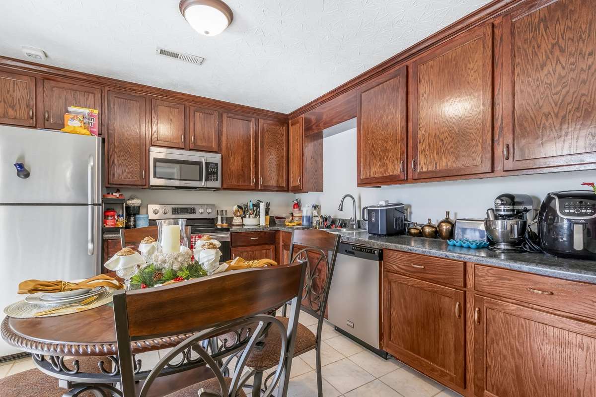 Stove, microwave, dishwasher and fridge remain... plenty of room for your kitchen gadgets too...