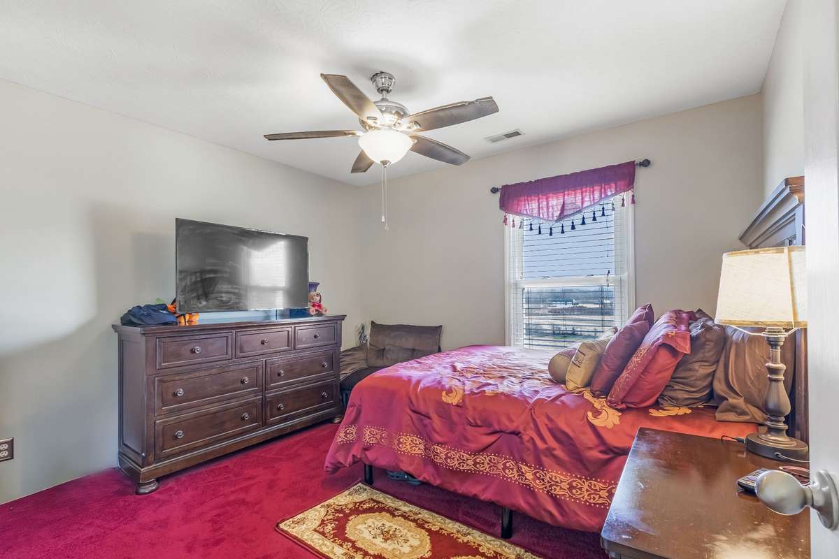 This bedroom overlooks the nursery down the hill and across the street.