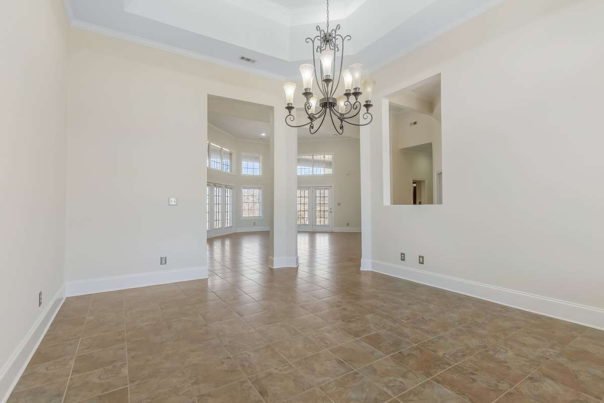 Here is another view of the dining room.. take notice of the incredible height of the ceilings.