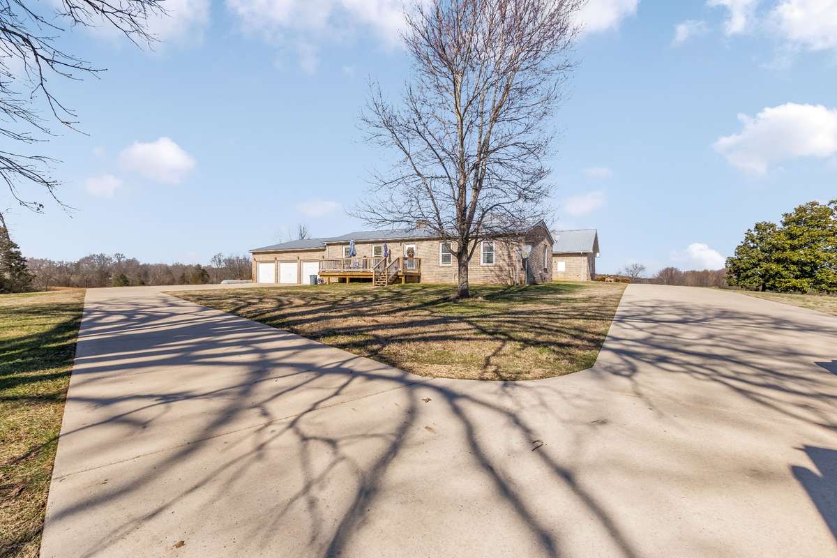 Separate driveway access for the main house and the guest house... each with plenty of parking!