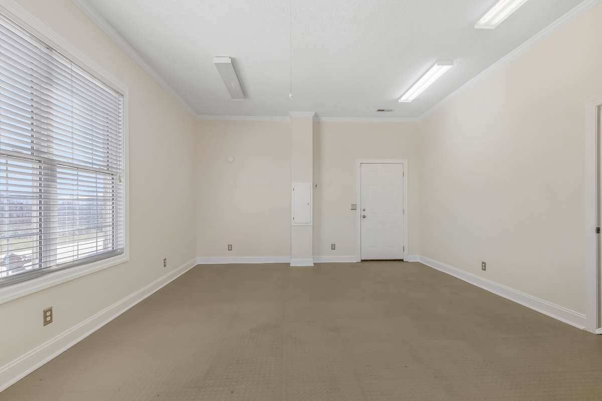 This room is perfect for the home gym you have always wanted - complete with comfort flooring. Through the door directly ahead and just across the courtyard is the guest house/mother in law quarters.