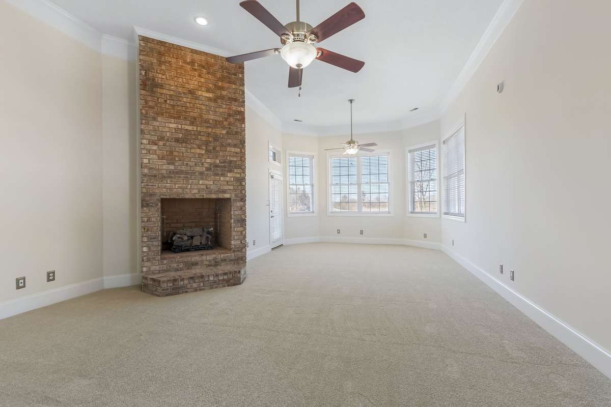 Private Master bedroom with an incredible view of your rolling Tennessee hills.. cozy up to the second fireplace in the home... This is YOUR private retreat!