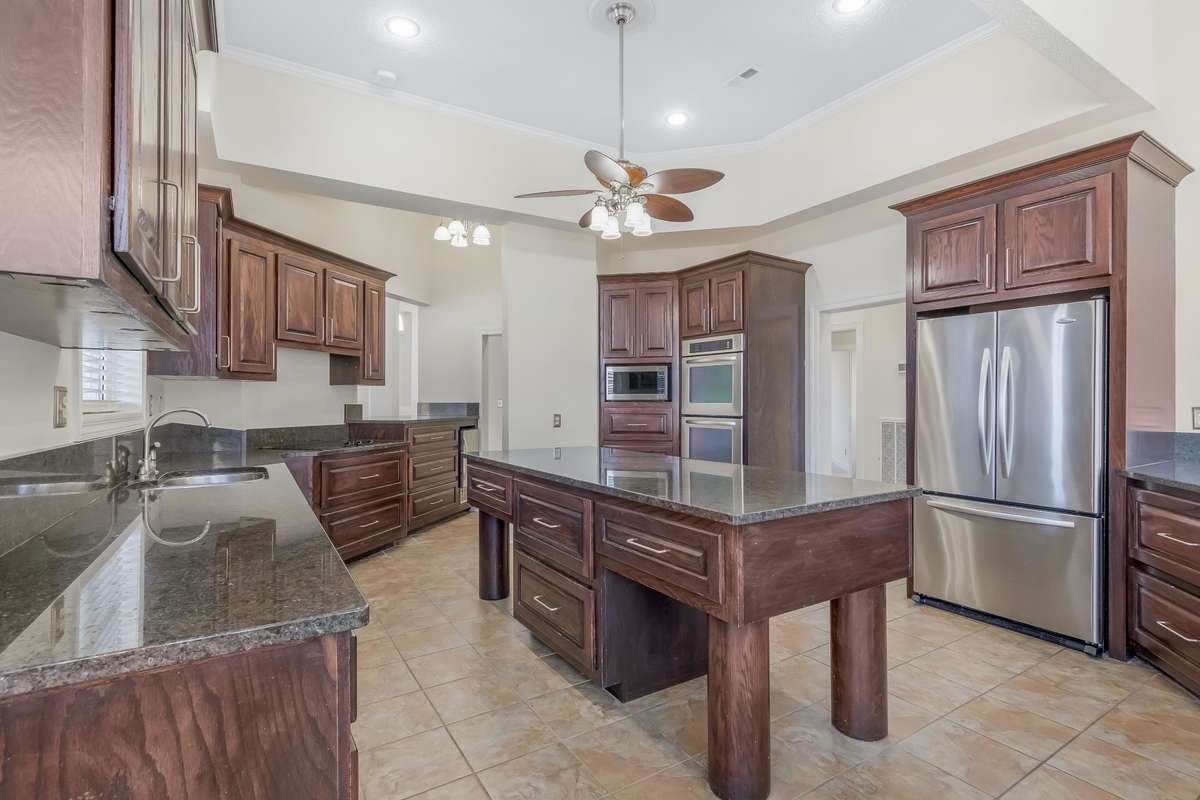 Chef's dream kitchen.. Take a look at the size of that prep island alone.