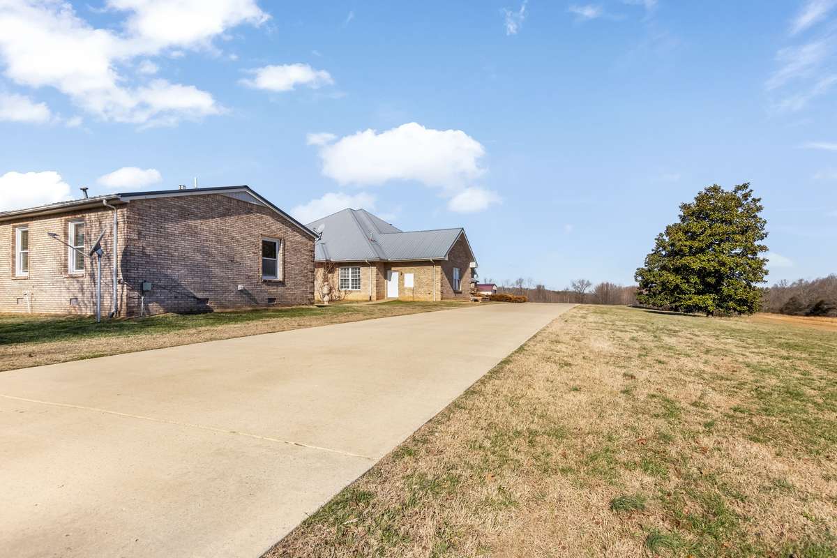 Fully concreted driveway to both homes...