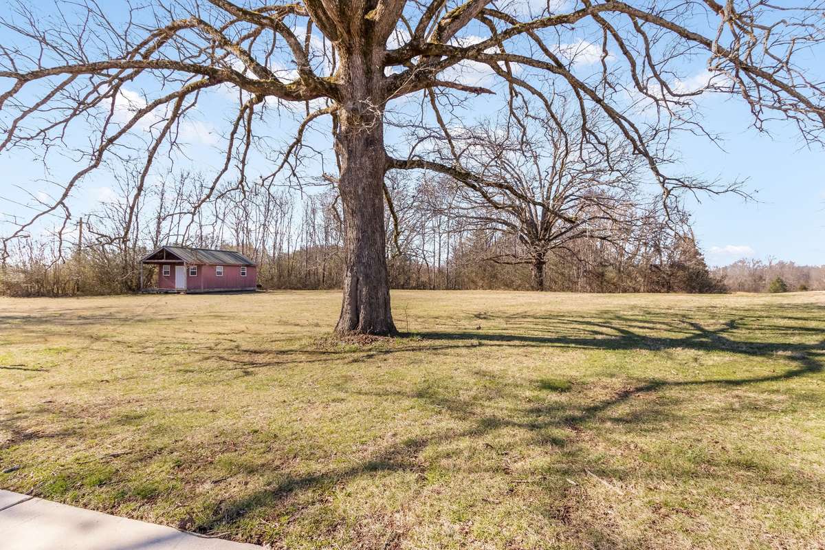 Do you homeschool? This building is also on the property... This would make a great homeschool location or hobby room? Do you paint or write? This quiet location on the property has "Artist Retreat" written all over it.