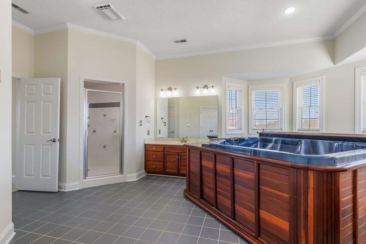Yes - There is a full size HOT TUB in your main bathroom... now you see why I mentioned you should bring your glass of wine along for the rest of the tour.