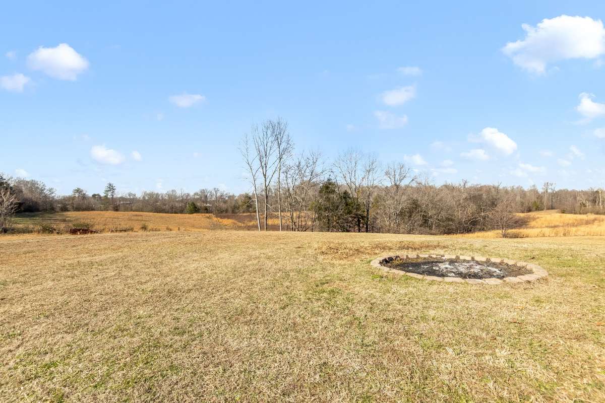 Overlook the treetops and open fields where deer wander at dawn and sunsets stretch across the hills