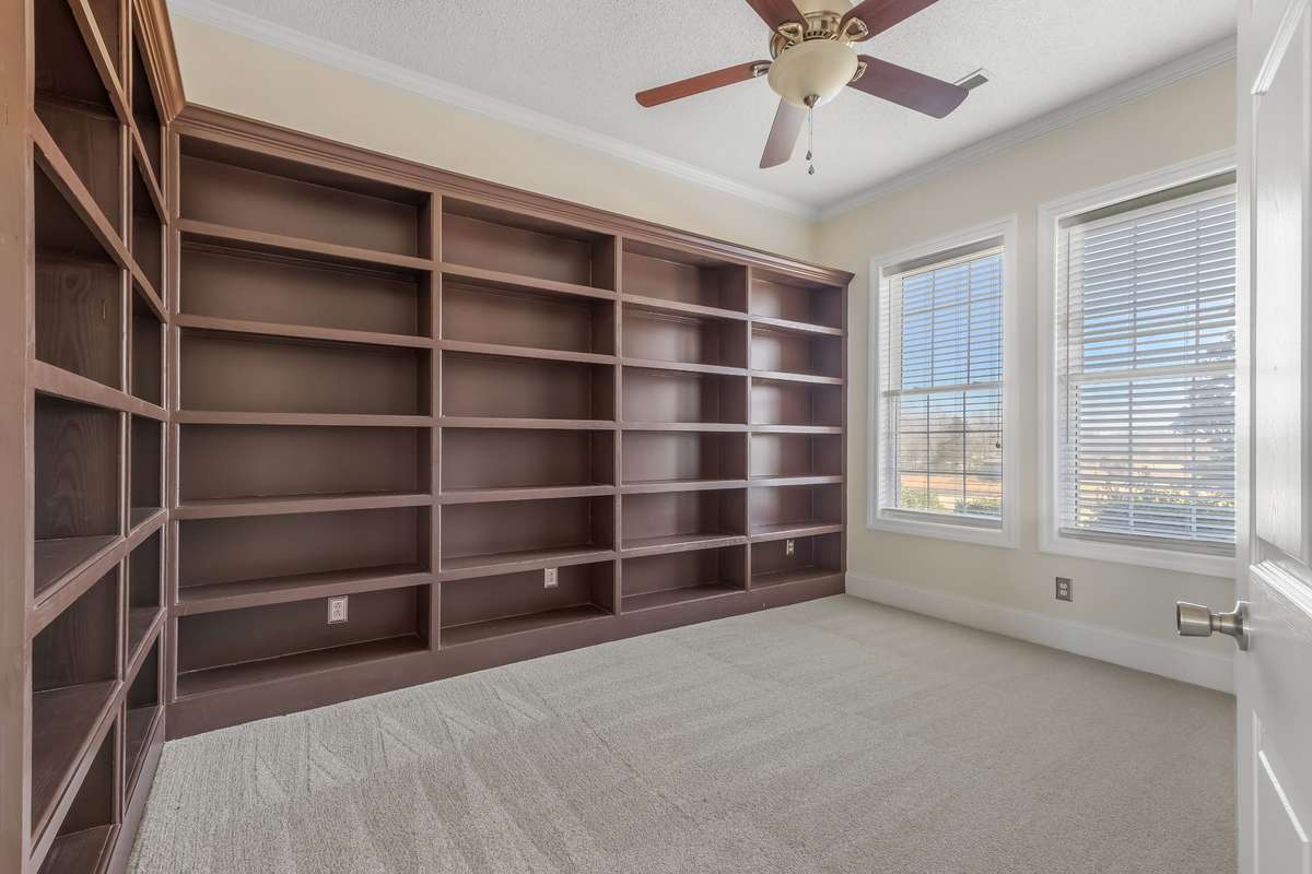 Library or private office complete with built in shelving perfect for your entire collection.