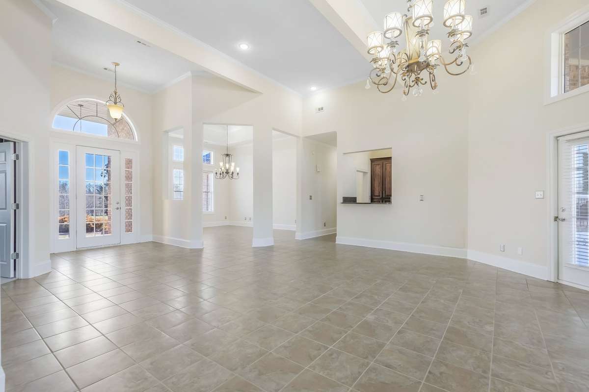 Stunning formal dining room is expansive ... located directly across from your massive kitchen.