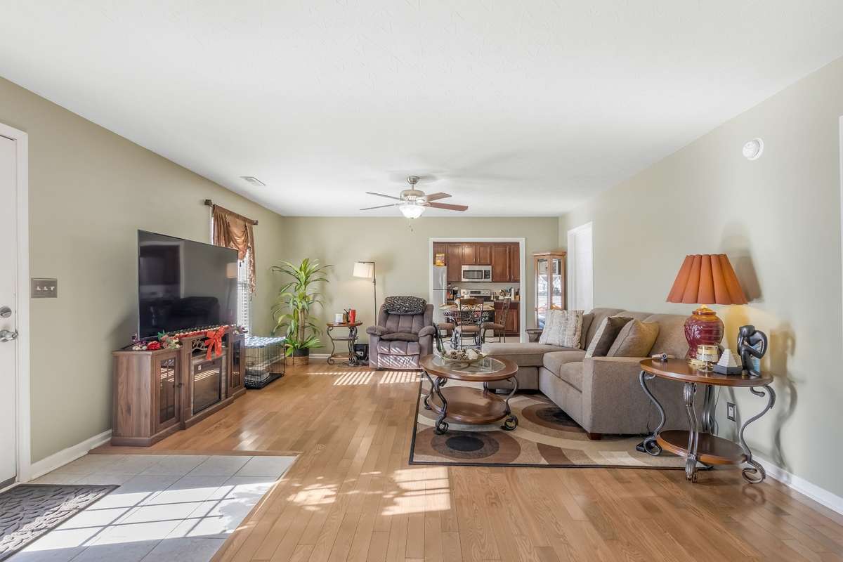 Inside of the guest home you will find warm wood floors and much like the main home this home is filled with natural lighting.
